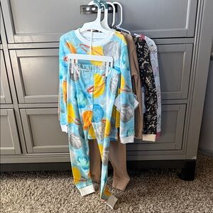 Four sets of long sleeve Burt’s Bees pjs